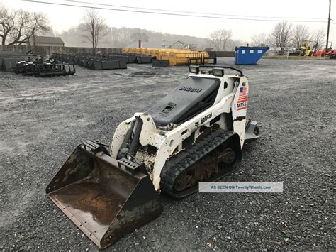 best stand on skid steer|bobcat stand behind skid steer.